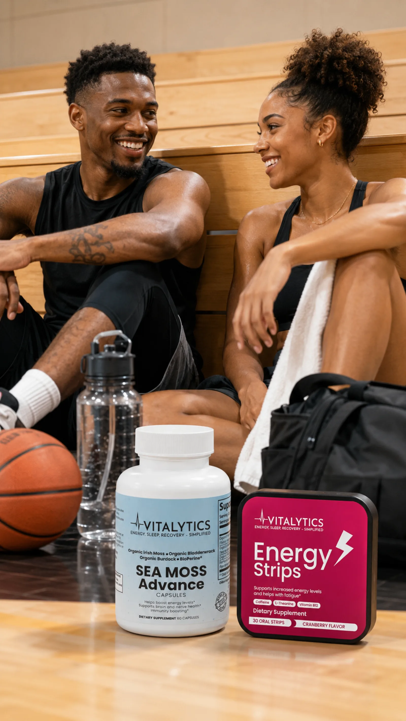 Two athletes sitting on bleachers with Vitalytics Sea Moss Advance and Energy Strips after a workout.
